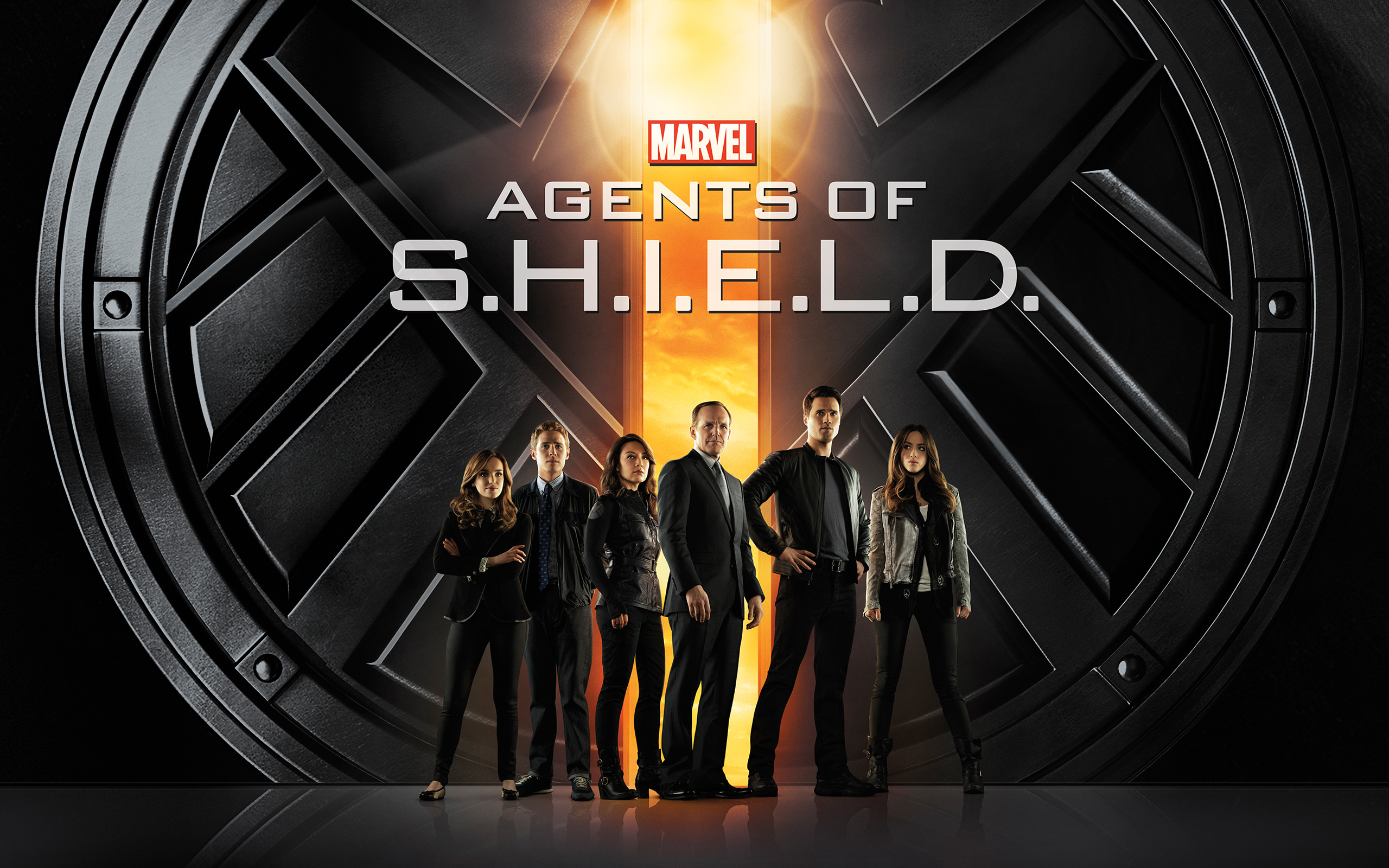 Agents of Shield promo poster, featuring Clark Gregg's Agent Coulson front and center.